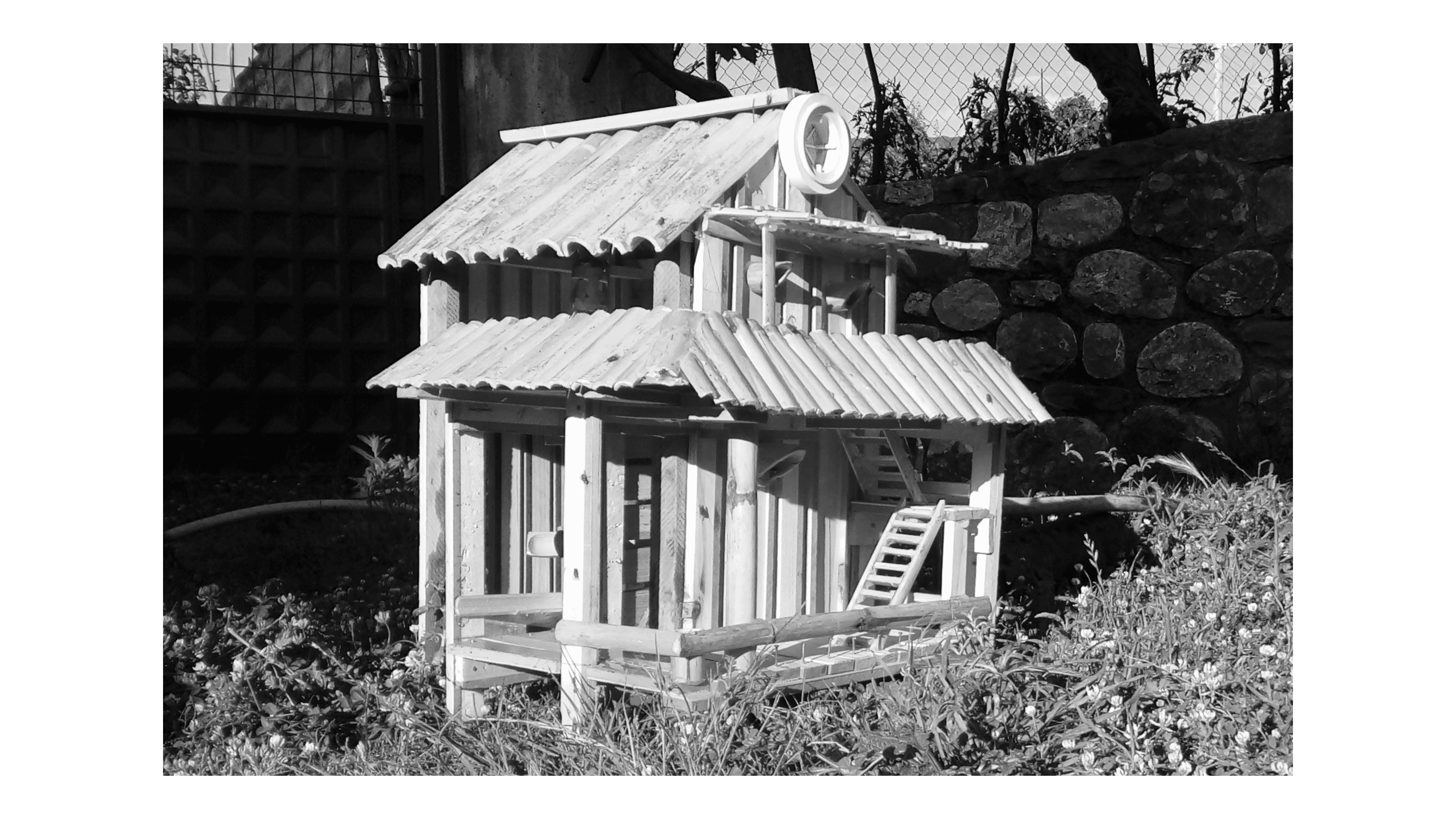 A functional water mill miniature, combining craftsmanship and detail.